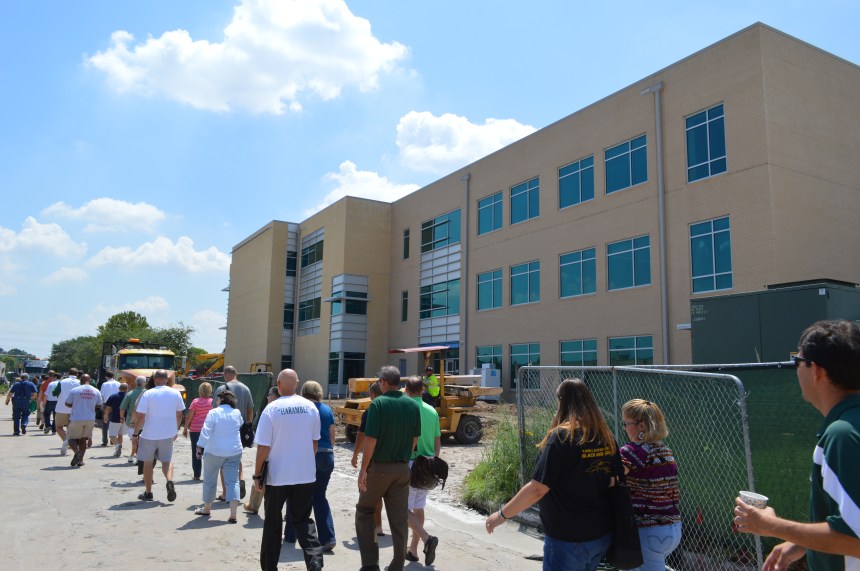 SJ faculty and staff tour the new science and engineering building during in-service. Photo: MAGIS