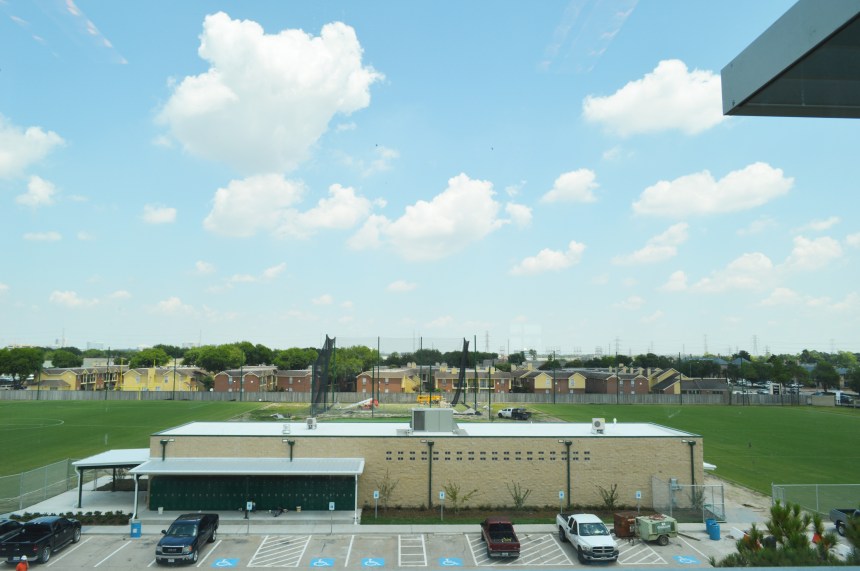 View of the new fields, field house, and golf facility from the third floor of the new science and engineering building. Photo: MAGIS