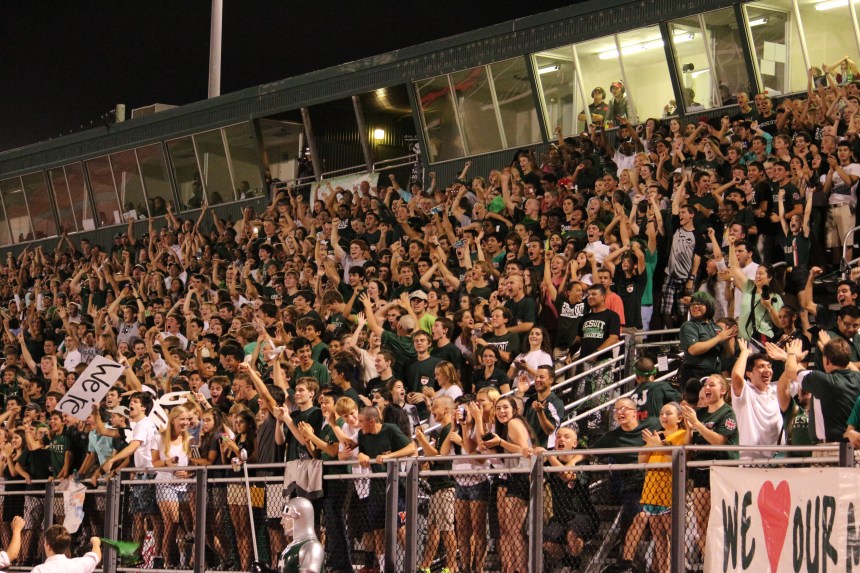The SJ student section and fans go wild with the Crusaders' four-down goal line stop in the STH rivalry game. Photo: The Crusader